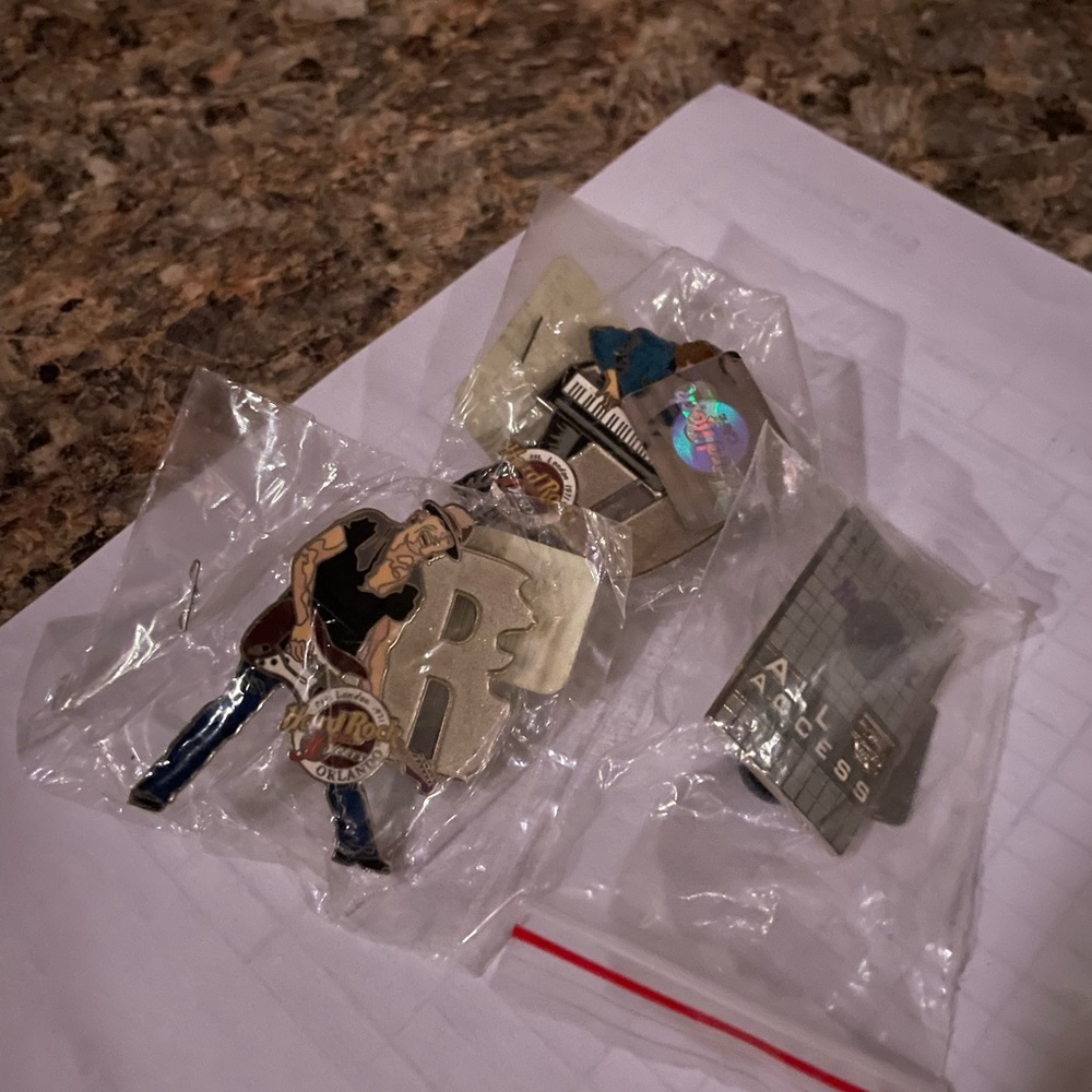 Hard Rock pins. 3 as shown
